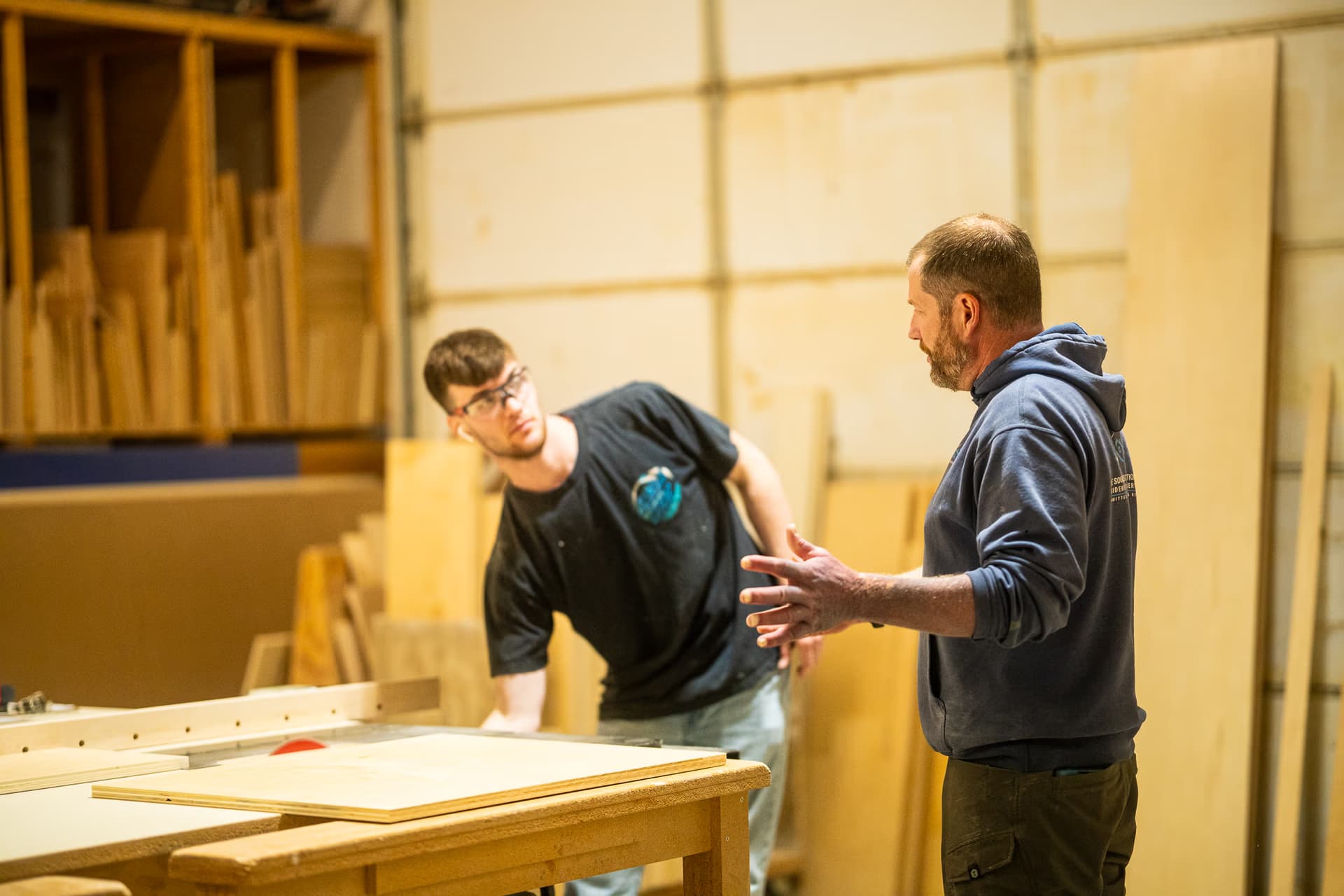 men working in a cabinet shop